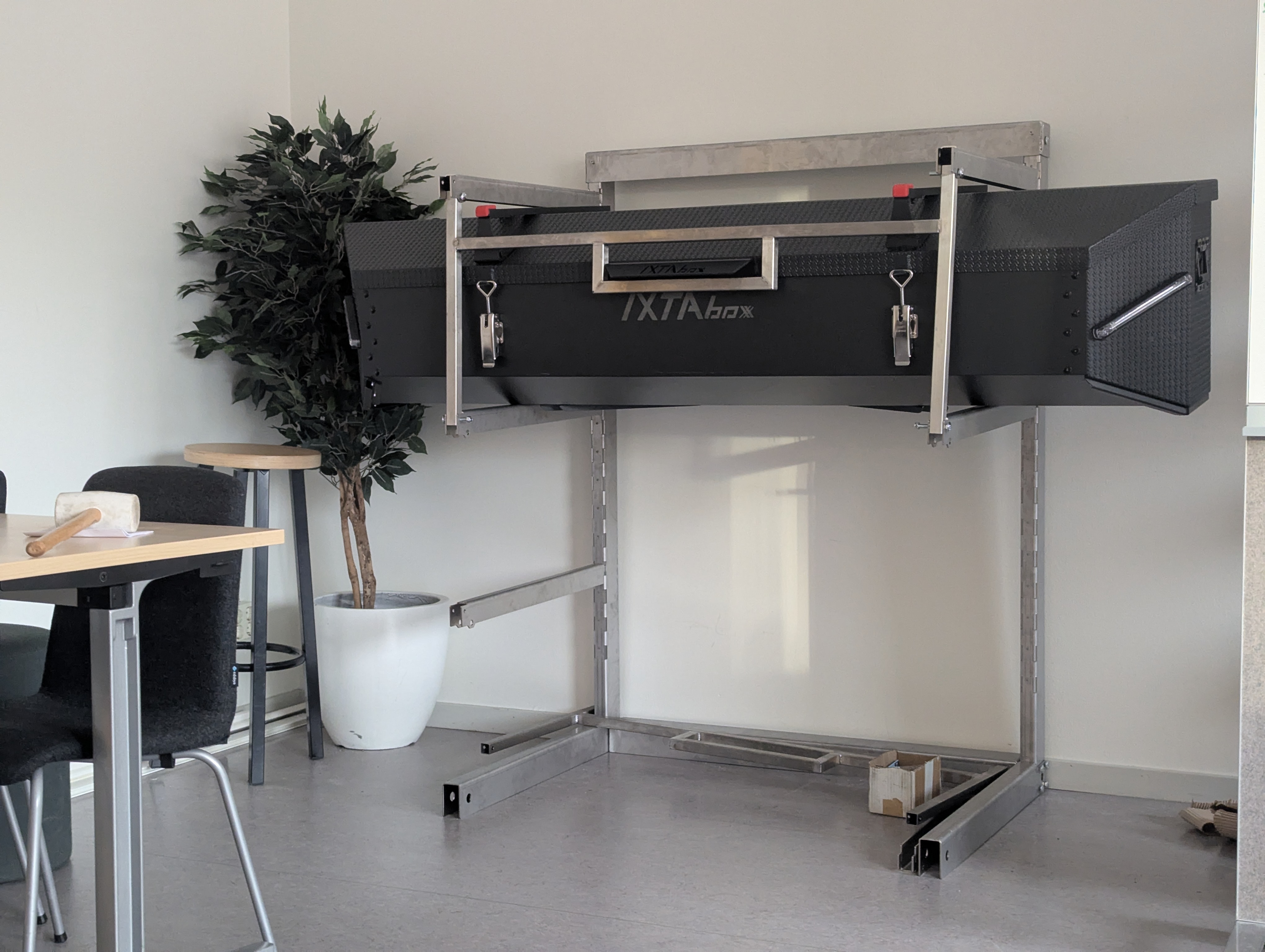 IXTAbox raised on the open stainless shelf of Prototype 1