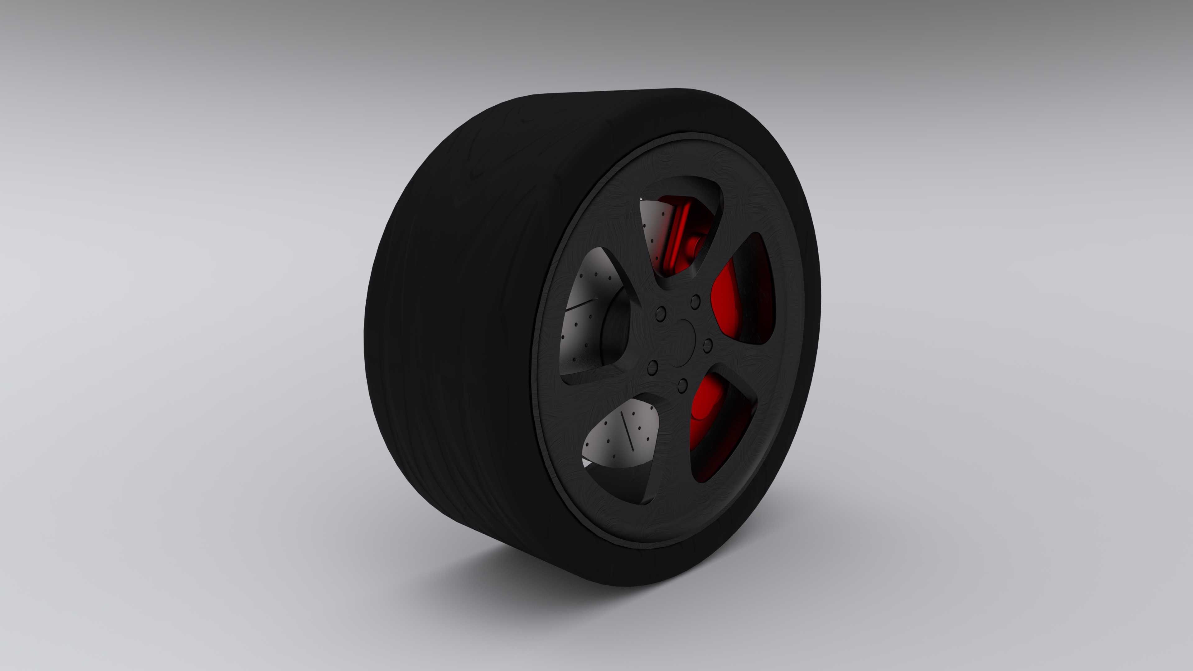 Render of a performance wheel and tyre with a red brake caliper